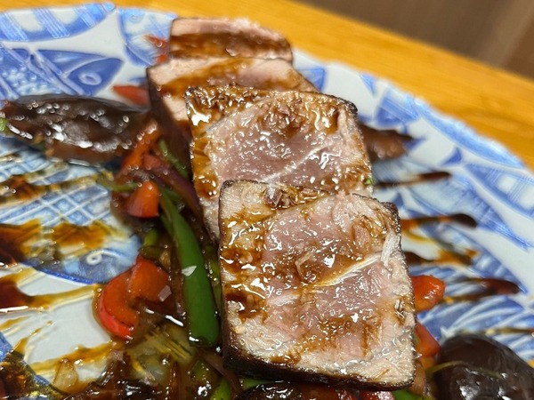 Grilled tuna with ratatouille, basil oil and parmesan