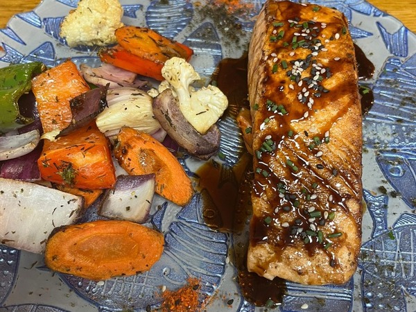 Grilled salmon with teriyaki sauce and sautéed vegetables